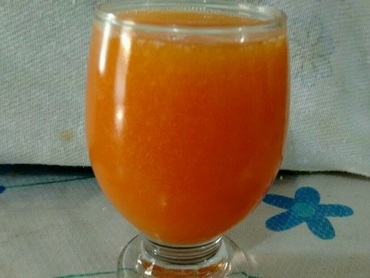 Suco de laranja com mamão